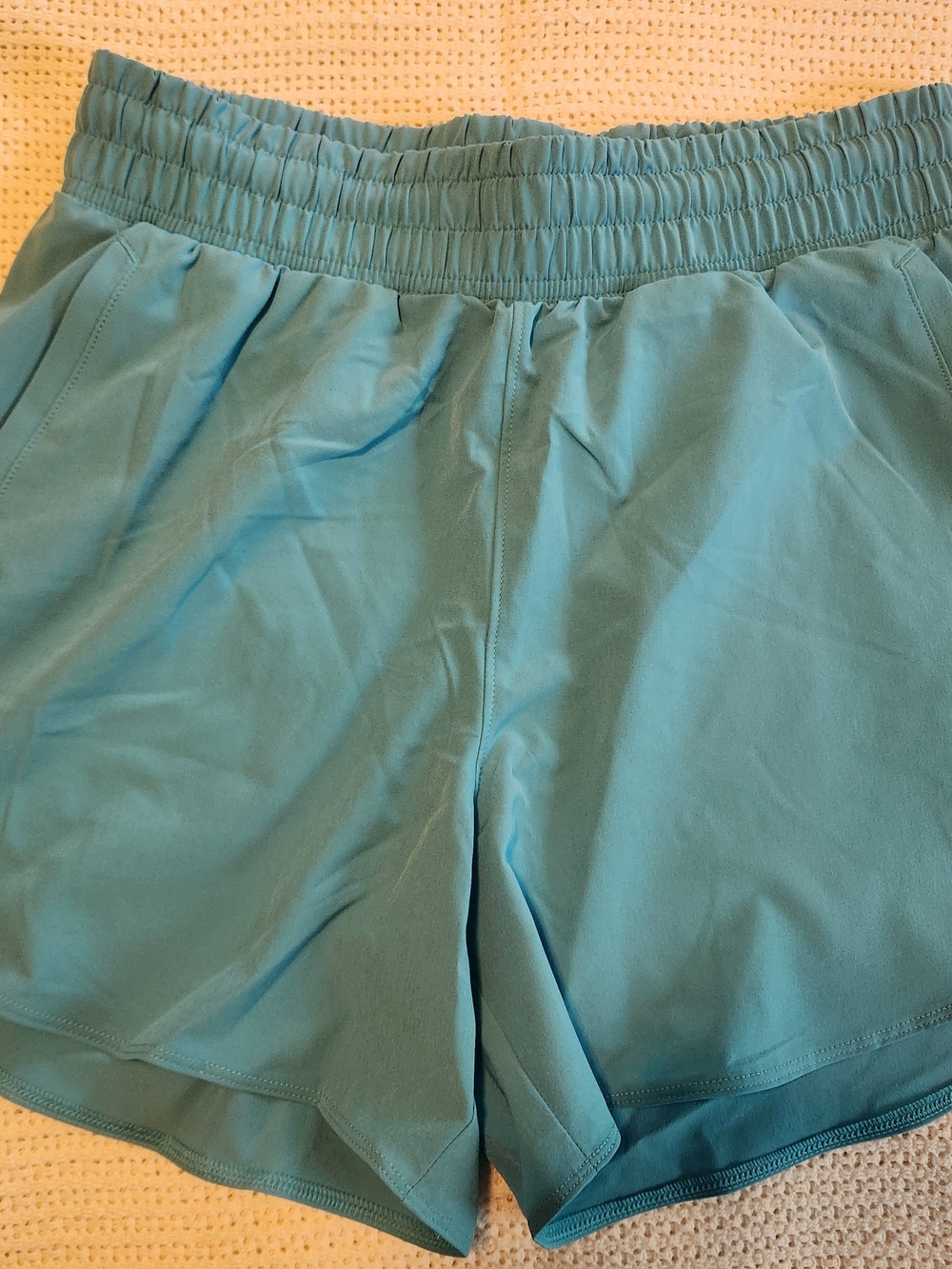 Under Armour Women's Teal Blue Flex Woven 5" Shorts